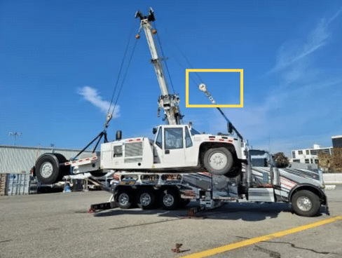 Rotator Truck lifting Rescued Vehicle with Massload Wireless Tension Link (courtesy Pepe's Towing)